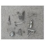 10 silver tone charms