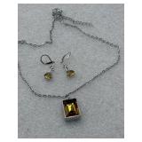 rectangular, emerald-cut yellow stone pendant and
