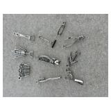10 silver tone charms