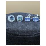 sterling silver stud earrings featuring