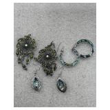 collection of fashion jewelry earrings, including