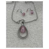 jewelry set features a silver-toned necklace with
