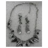 feather-themed jewelry set consisting of a