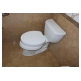 Pair Kohler Toelets with Lifted Seats