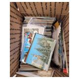 Postcards hundreds in medium flat rate box, mostly