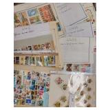 Africa Stamps on mix of pages, thousands of mint a