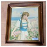 Framed Print of Woman in Rose Garden