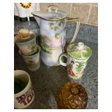 Collectible Teaware and Decorative Objects - two shelves full