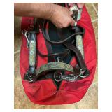Show Horse Harness and Red Duffel Bag