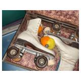 Pair of Silver Cup Roller Skates