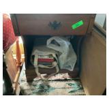 Small Wooden Side Table, Framed Art, and Metal Chair