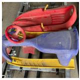 Two Snow Sleds - Red Toboggan and Blue Steerable Sled