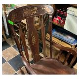 Dark Wood Rocking Chair with Grape Vine Motif