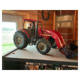 Two Toy Tractors: Case IH and New Holland