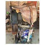 Lot of Used Saddles and Saddle Stand