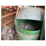 55 gallon drum full of fence clips.