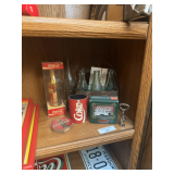 Coca-Cola Advertising Collection: Gold Commemorative Bottle, Carriers, and More