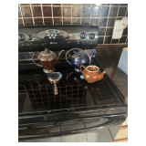 Collection of Teapots & Magnifying Glass