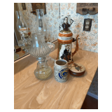 Collectible Stein and Oil Lamps featuring Norman Rockwell and St Louis Rams
