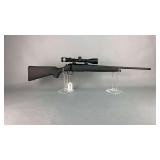 Thompson Center/Smith & Wesson   308 Win   Compass, Blued and Composite, Bolt action rifle   SN# THK4693  Nikon Buckmaster II 3-9x40 scope, w/box
