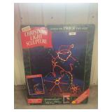 Mr. Christmas Unicycling Santa Light Sculpture