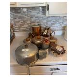 Kitchenware Collection Including Metal Canisters, Molds, and Sifter