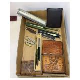 Assorted Collection of Pocket Knives, Leather Wallets, and Writing Instruments
