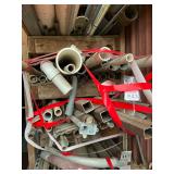 2 shelves of plastic pipe, copper, steel, tubing and more