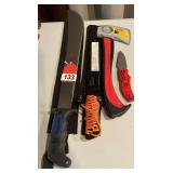 1 Mintcraft machete, 1 Paracuda FS Machete, 1 True Temper camp ax + more in display
