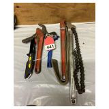 Diamond chain wrench, strap wrench, Ridgid meter wrench, Dewalt knife and 1 Irwin auto pipe wrench