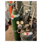 Torch set up with Air gas tanks, 50 ft. of hose, 2 Harris torches, extra cutting tips and brazing tips, and cart - ready to work