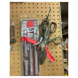 3 tin snips and 1 set of 3/8 extensions