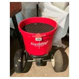 1 Earthway seed or fertilizer spreader with tongue, used one time, like new