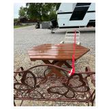 1 picnic table wooden, 1 swivel rocker and 1 butterfly rocking bench