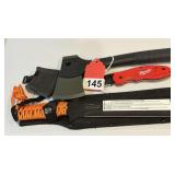 1 Paracuda FS Machete, 1 Milwaukee folding knife, 1 New Buck Camp ax w/ sheath