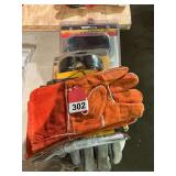 5 good pair of welding gloves and 2 new pair, welding goggles, and welding glasses