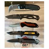 5 knives on display with most high end knives