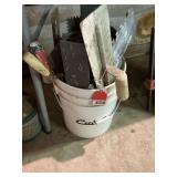 1 bucket full of invert floats, trowels, and lots of concrete tools