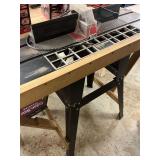 Craftsman Router table with a 1/2 HP craftsman router attached, laminated extensions on both ends