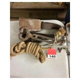 1 Bull nose clamp with lead rope, Cowbell with neck strap used on a Hereford named Clarabell in the late 1940