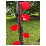 Shooting tree with 6 swinging targets made from 1/4 inch AR500 steel, withstands all handgun ammunition except magnums. Base designed to be buried about 16 inches, 15 degree angle built in. Good for 2