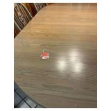 Large Oak Dining room table with 2 leaves and 6 chairs