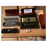 Various pen sets, 3 imark wooden pen set, set of gray pens in case, 1 set of Cross pens w/ paperwork, 2 other pen sets, 1 Nebo pen light