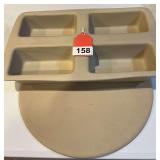 1 Pampered Chef mini loaf dish and a Pampered chef pizza stone, never used