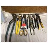 6 adjustable pliers and 2 other tools
