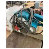Makita 3 inch belt sander, box and 2 boxes of belts