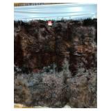 Black Bear rug, bear killed in Otter Tail county, Minnesota about 1950, has a nice black felt sewn in lining