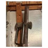 1 post driver, 1 double bit ax, 1 long handled magnet, 1 new sledge handle and 1 vintage wooden baseball bat