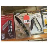 Several new knives with one that has replaceable razor blades