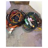 Assorted Electrical Extension Cords, Power Strips, and Jumper Cables